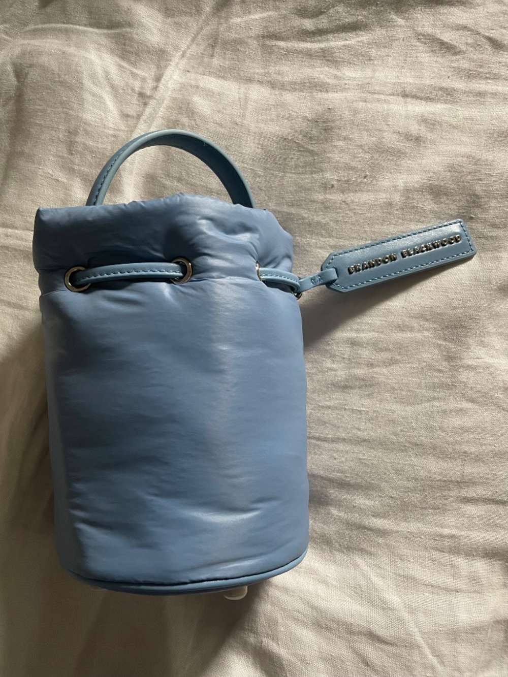Brandon Blackwood Kamal nylon puffer bucket bag in baby blue